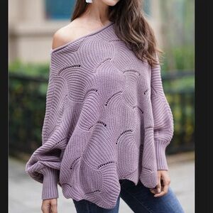 Large lilac knit oversized sweater.